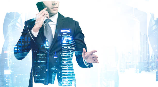 istock Businessman talking on smartphone in city 1216968054