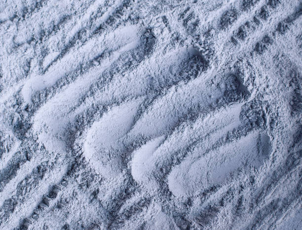 istock Gray (light blue) bentonite clay powder texture close up, selective focus. Abstract background. 1216968159