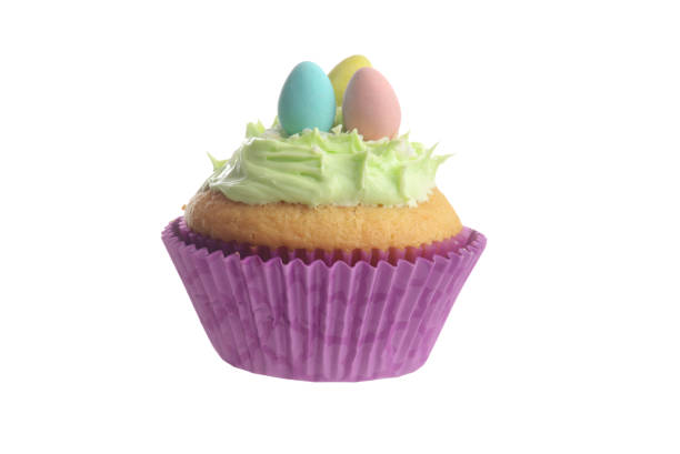istock isolated easter cupcake with green frosting and mini eggs 1216968285