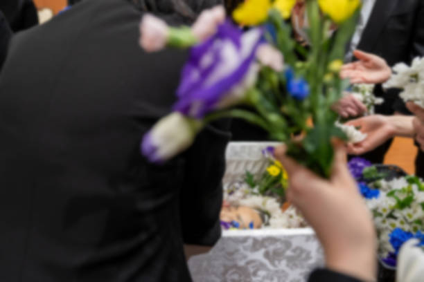 Japanese family funeral ceremony during COVID-19, defocused Japanese family funeral ceremony during COVID-19, defocused coffin crematorium stock pictures, royalty-free photos & images