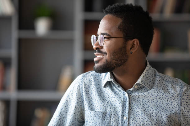 istock Smiling young mixed race man planning new day. 1216968914