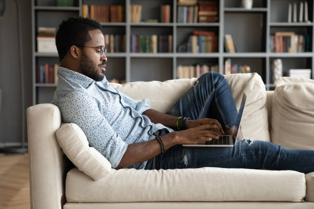 istock Concentrated mixed race young businessman communicating with partners clients. 1216969471