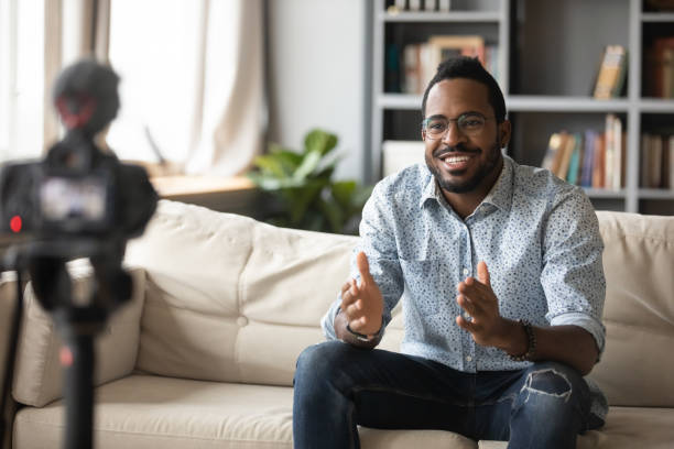 istock Happy young african american man recording educational video webinar. 1216969481