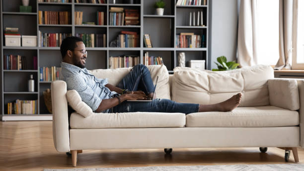 istock Smiling young biracial guy dating, spending leisure time online. 1216969482