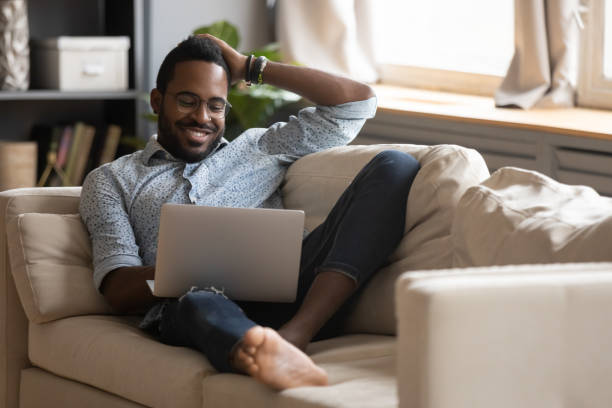istock Dreamy young mixed race guy dating online in social network. 1216969483