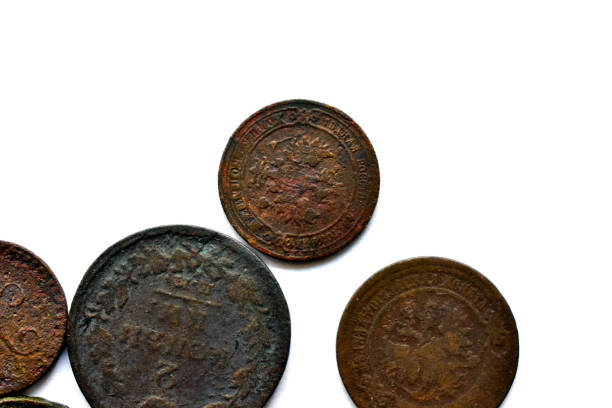 istock Old Imperial Russian coins on a white background (Translation: Kopeck, kopeck in silver) 1216969692