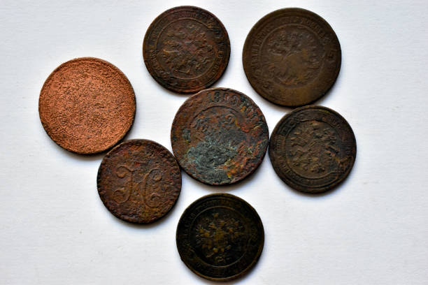istock Old Imperial Russian coins on a white background (Translation: Kopeck, kopeck in silver) 1216969715