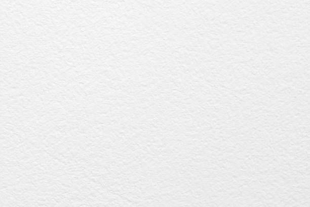 istock White grey color concrete cement wall texture for background and design art work. 1216969788