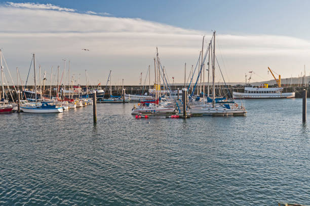 istock Marina in seaside town with sailing yachts 1216969974