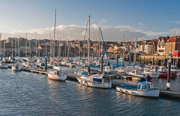 istock Marina in seaside town with sailing yachts 1216970110