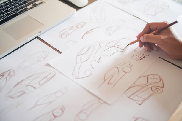 istock Graphic designer artist Work drawing sketch design development Prototype car Automotive industrial creative visual concept 1216971234