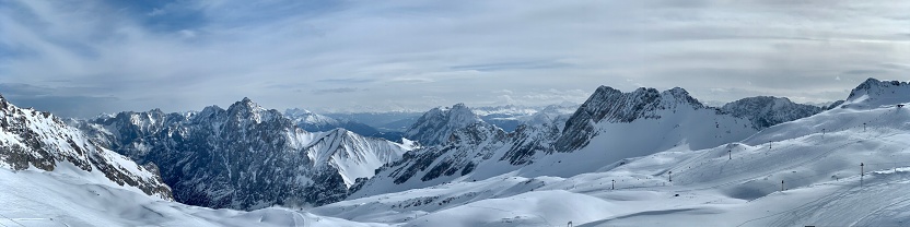 XXL Panorama of the german and austrian alps seen from the highest German / Austria mountain Zugspitze