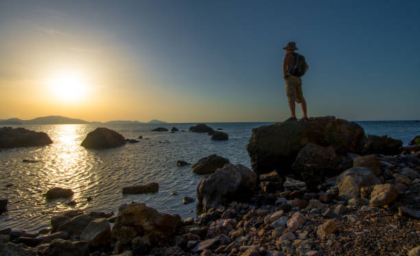 istock traveler on the seashore 1216973878