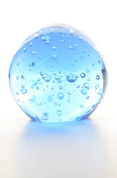 istock Glass paper weight blue 1216977294
