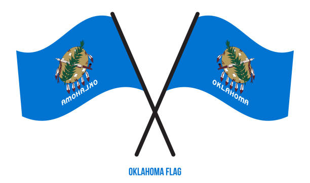 dwa skrzyżowane machając flaga oklahoma na odizolowanym białym tle. - flag of oklahoma stock illustrations
