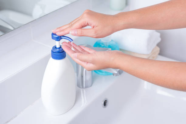 Wash your hands with soap and water to destroy Corona Virus Disease (COVID-19) stock photo