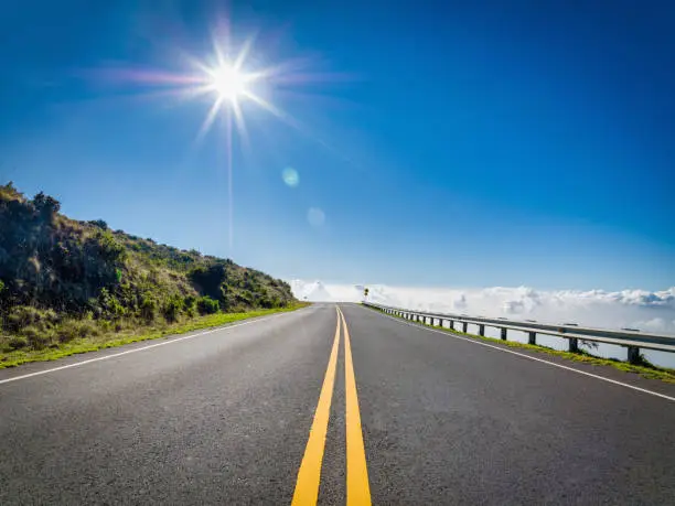 Open Highway leading towards the clouds. Haleakala Volcano Highway, Haleakala National Park, Maui Island, Hawaiian Islands, USA. Hasselblad, 50MPixel XXXL Photo