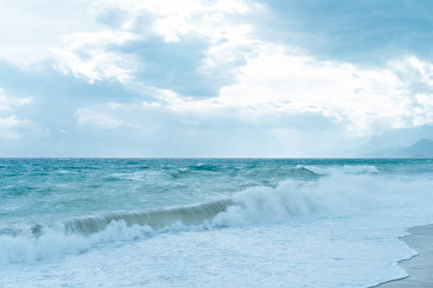 istock Storm Mediterranean Sea  blue sea with clouds and high waves 1216984394