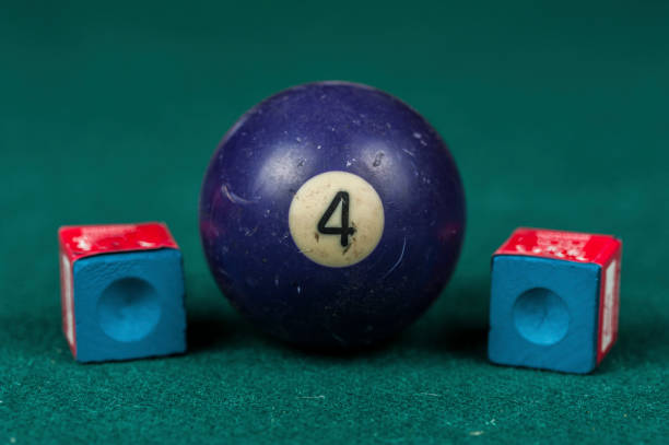 istock Billiards balls and cue on billiards table. Billiard sport concept. 1216984766