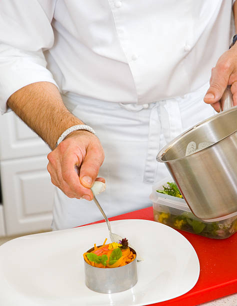 istock Chef decorate plate with food 121698494