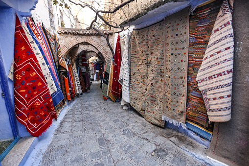 Clothing and rug shops in Chefchaouen, Morocco.