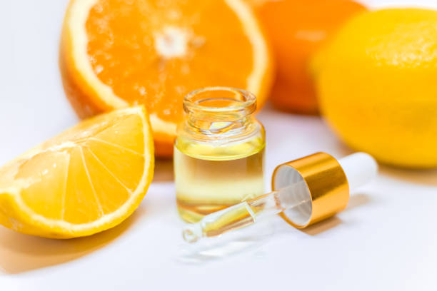 istock Orange essential oil on a white isolated background. Selective focus. 1216985907