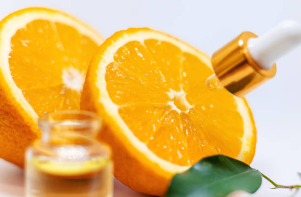 istock Orange essential oil on a white isolated background. Selective focus. 1216986141