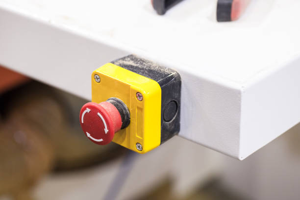 istock Emergency stop industrial button, close-up photo 1216986313