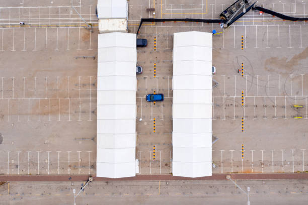 istock Corona Virus drive through for Sample collecting, Top down aerial view. 1216988420