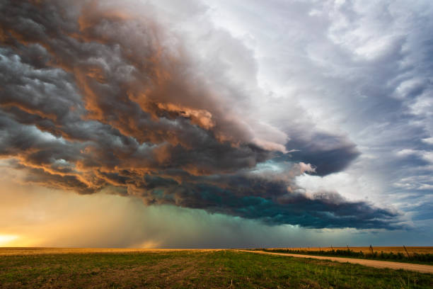 Stormy sky with dramatic clouds Stormy sky with dramatic clouds at sunset as a thunderstorm approaches. ominous photos stock pictures, royalty-free photos & images