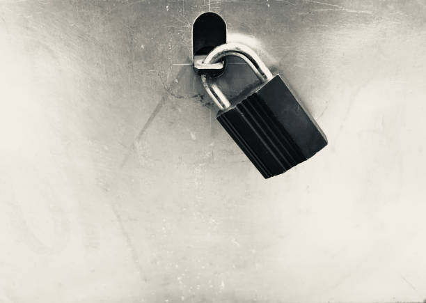 Metallic door locks isolated unique black and white photo