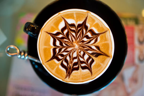 istock Top view of Latte coffee in grass cup on table. 1216991567
