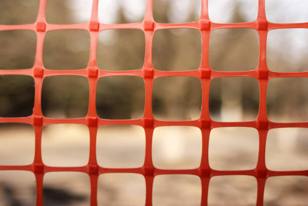 istock Plastic red mesh close up, background out of focus 1216991650