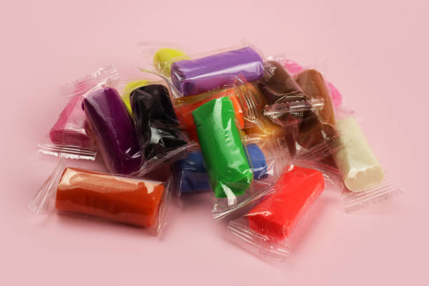 istock colorful clay, plasticine on a pink background 1216991877