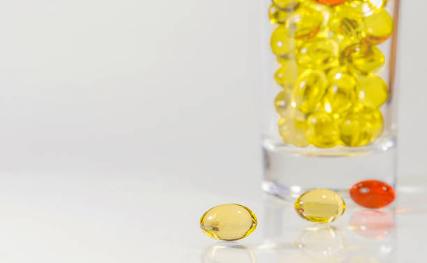istock transparent medical capsules on a light gray background 1216993484