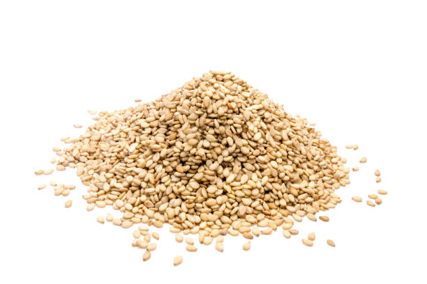 istock Sesame seeds isolated on white background 1216995828