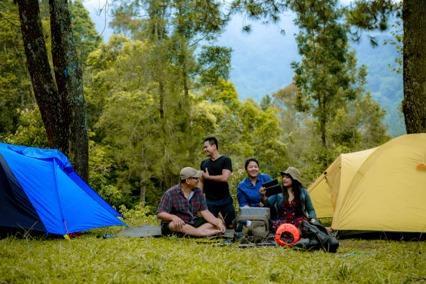 istock friends happy and enjoy camping at the rain forest 1216995914