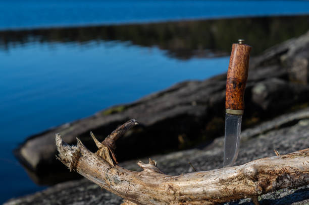 istock Knife with wooden handle outdoor 1216996843