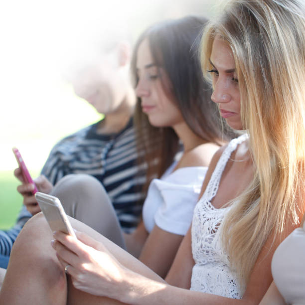 istock Girls with their smartphones 1216997040