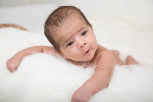 istock Newborn Baby - stock photo 1216997675