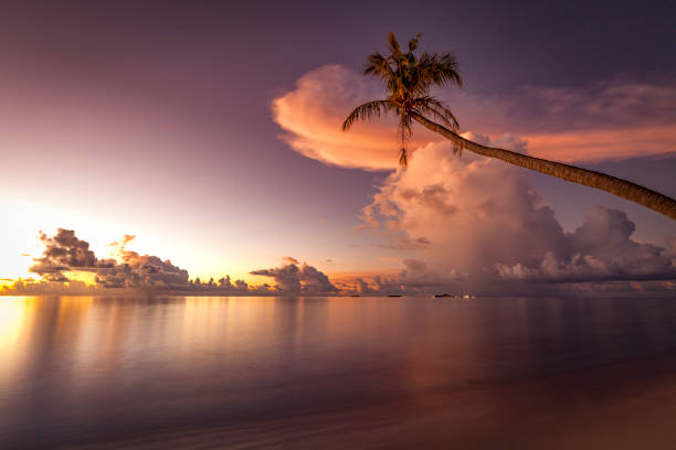 cloudscape sunset on maldives islands