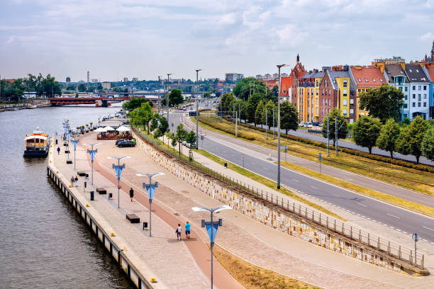 piastowski boulevard on odra river embankment with ships converted to restaurants - industry szczecin europe nautical vessel imagens e fotografias de stock