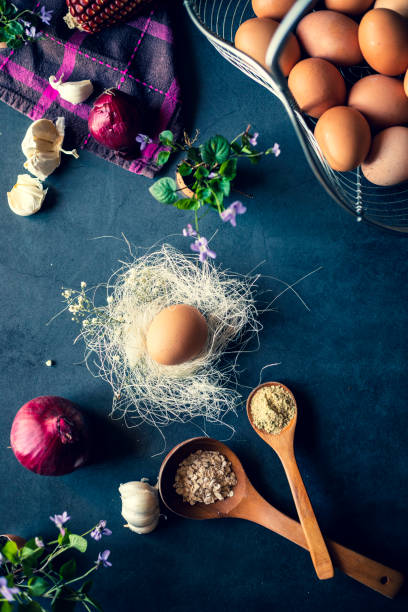 istock Easter eggs in the nest on a black board. 1217005782