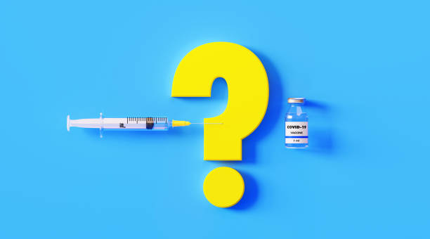 istock COVID-19 Vaccine Bottle Question Mark and Syringe on Blue Background 1217006044