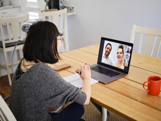 istock Woman Working Mother at Home on a Web Chat Meeting 1217006334