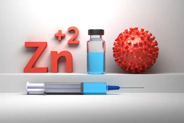 Photo of Zn ions virion virus particle and syringe as medication for disease