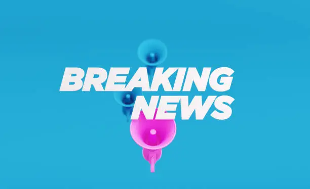 Photo of Breaking News Written over Blue and Pink Megaphones on Blue Background