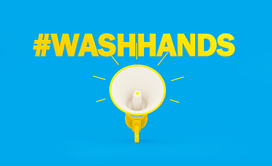 #Wash Hands written over yellow megaphones on blue background. Horizontal composition with copy space. Announcement concept.
