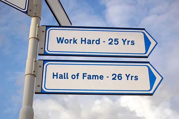 Photo of hard work and hall of fame signs