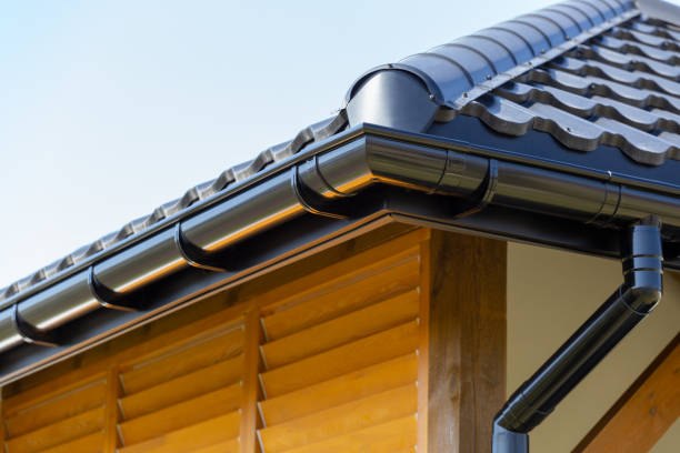 corner of the new modern house with roof and gutter and wooden shutter - roof tile architectural detail architecture and buildings built structure imagens e fotografias de stock